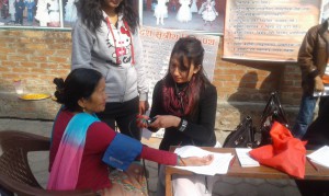 Nurses checking up on an old beneficiary 2